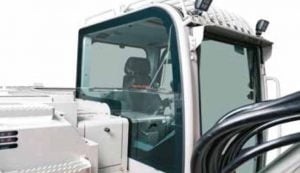 Puerta de cabina de excavadora pesada con cristales reforzados y estructura robusta para maquinaria de construcción robusta.