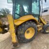 RetroPala, Marca: NEW HOLLAND, Modelo: LB 110, Año fabricación 2001, equipada con dos cazos y matriculada.