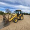 RetroPala, Marca: NEW HOLLAND, Modelo: LB 110, Año fabricación 2001, equipada con dos cazos y matriculada.