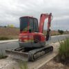 Miniexcavadora YANMAR VIO55, Año 2006, Horas: 7153 H, equipada con cazos de 40,60 y 80. Con cuchillas en cazo de 60 y 80. Enganche Mecánico.