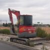 Miniexcavadora YANMAR VIO55, Año 2006, Horas: 7153 H, equipada con cazos de 40,60 y 80. Con cuchillas en cazo de 60 y 80. Enganche Mecánico.