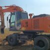 Excavadora, HITACHI, ZAXIS ZX210W, Año de fabricación 2006, Horas: 14379 Aprox, dos cazoscazo, Aire acondicionado recien cargado, Frenos reparados.