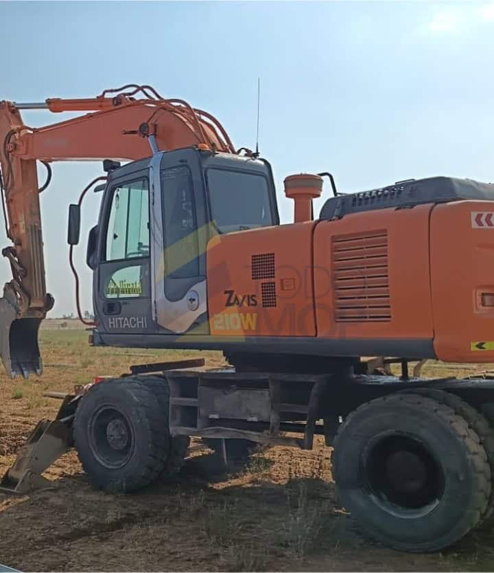 Excavadora, HITACHI, ZAXIS ZX210W, Año de fabricación 2006, Horas: 14379 Aprox, dos cazoscazo, Aire acondicionado recien cargado, Frenos reparados.