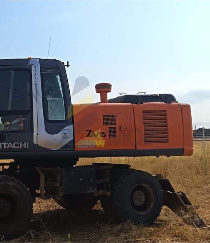 Excavadora, HITACHI, ZAXIS ZX210W, Año de fabricación 2006, Horas: 14379 Aprox, dos cazoscazo, Aire acondicionado recien cargado, Frenos reparados.