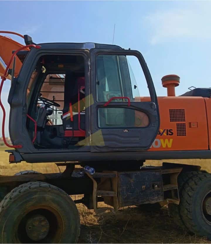 Excavadora, HITACHI, ZAXIS ZX210W, Año de fabricación 2006, Horas: 14379 Aprox, dos cazoscazo, Aire acondicionado recien cargado, Frenos reparados.