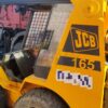 Minicargadora, JCB SS165 , Año fabricación 1997, Horas: 2643, equipada con pala, retro. Matriculada. Maquinaria lista para trabajar.