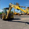 Retro Pala, Marca: NEW HOLLAND, Modelo: B 110 , Año fabricación 2003, Horas: 20.000 Aprox, equipada con dos cazos, 40 y limpieza, Horquillas portapalet, pala de almeja, brazo telescópico, mandos pilotados, matriculada. Maquinaria lista para trabajar.